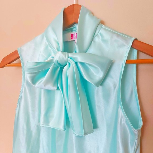 Silky sleeveless blouse with bow - Picture 1 of 5